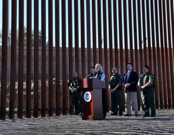 Department of Homeland Security Secretary Kirstjen Nielsen inaugurates a newly completed renovated section of the border wall at the U.S.-Mexico border in Calexico, Calif. As a migrant caravan heads toward the U.S., Nielsen says her agency has asked for the military's help. (Mark Ralston/AFP/Getty Images)