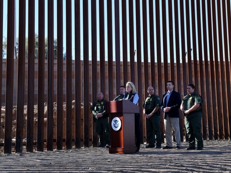 Department of Homeland Security Secretary Kirstjen Nielsen inaugurates a newly completed renovated section of the border wall at the U.S.-Mexico border in Calexico, Calif. As a migrant caravan heads toward the U.S., Nielsen says her agency has asked for the military's help. (Mark Ralston/AFP/Getty Images)