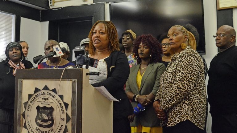 Women alleging workplace harassment in Philadelphia city government speak Wednesday at the Guardian Civic League headquarters. (Tom MacDonald/WHYY)