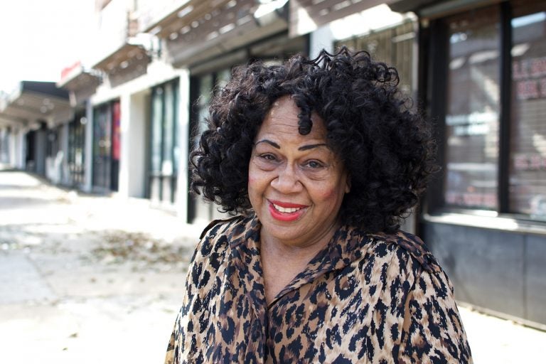 Shirley Armstead poses in front her E. Vernon Road storefront office. (Bastiaan Slabbers for PlanPhilly)