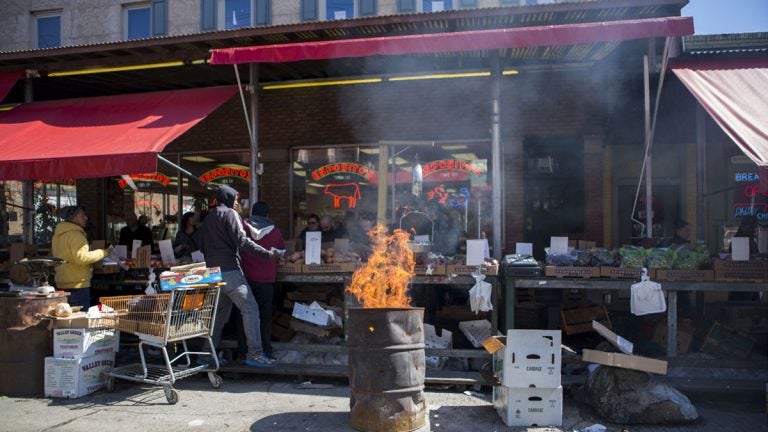 Vendors sell produce in the Italian Market neighborhood on South 9th Street in Philadelphia, Pennsylvania on March 22, 2017. (Jessica Kourkounis for WHYY, file)