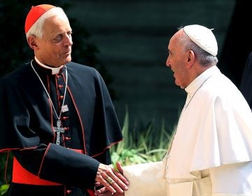 Pope Francis has accepted the resignation of the Archbishop of Washington, Cardinal Donald Wuerl. The two are seen here during the pope's visit to Washington, D.C., in 2015.