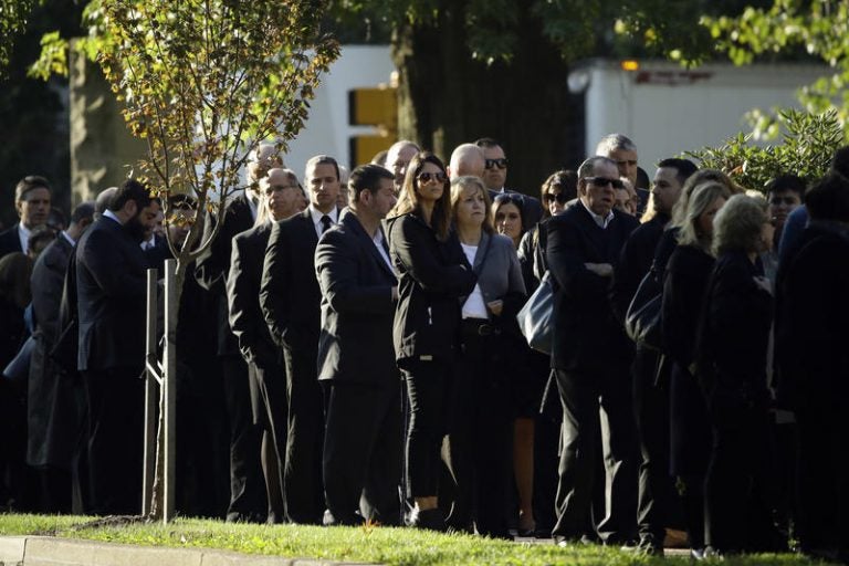 Mourners gather outside Rodef Shalom Congregation before the funeral services for brothers Cecil and David Rosenthal, Tuesday, Oct. 30, 2018, in Pittsburgh. The brothers were killed in the mass shooting Saturday at the Tree of Life Synagogue. (Matt Rourke/AP Photo)