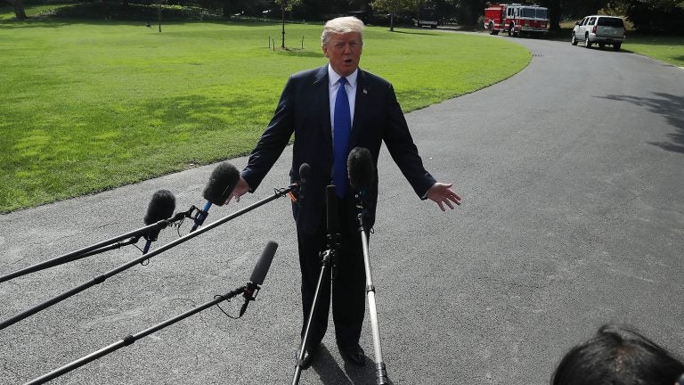 President Donald Trump speaks to the media before departing from the White House en route to speak with electrical workers in Philadelphia, Penn