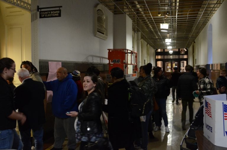 Voters formed a long line in Philadelphia City Hall last week to get their absentee ballots. (Tom MacDonald/WHYY)