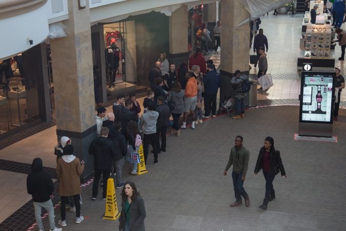 Shoppers line up for thir oppurtunity to shop at ADIDAS on Black Friday at the King of Prussia Mall in Pennsylvania November 23rd 2018. (Emily Cohen for WHYY)