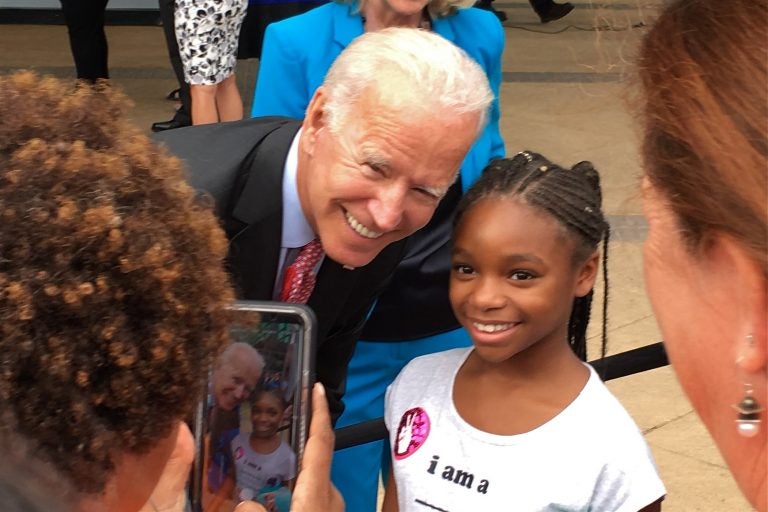 Joe Biden poses for a selfie with a young fan. (Delaware's Joe Biden/WHYY)