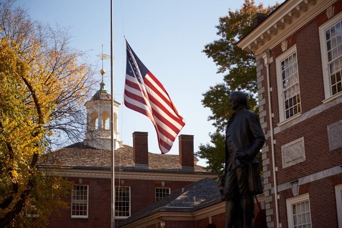 The American flag flown half-staff at Independence National Historical Park in Philadelphia on the centennial anniversary of Armistice Day to commemorate the American men and women who lost their lives in WWI. (Natalie Piserchio for WHYY)