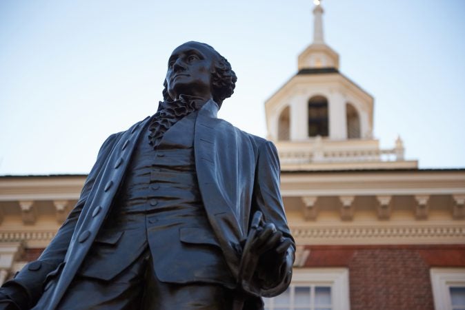 Statue of George Washington in front of the centennial bell at Independence Mall in Philadelphia on the 100th anniversary of Armistice Day, Nov. 11, 2018. (Natalie Piserchio for WHYY)