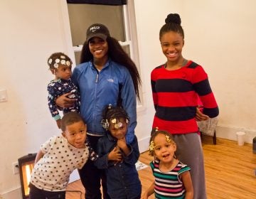 Ricci Rawls and her children, Patience, 12, Charlie, 7, Izzy, 5, Ava 4, and Faith, 1 on their last day before eviction. (Kimberly Paynter/WHYY)