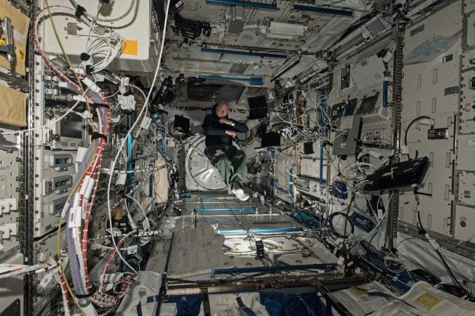 Scott Kelly floating in the Japanese experimentation module (courtesy of NASA)