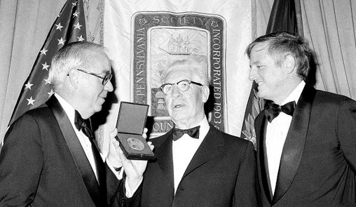 The Pennsylvania Society gala is a longstanding tradition. Here, onetime Society president Edward Gerrity Jr. presents the organization's medal to Pittsburgh Steelers founder and president Arthur Rooney Jr. in 1975, during the Society's 77th annual dinner at New York's Waldorf Astoria Hotel, Dec. 13, 1975. At right is William F. Buckley Jr., editor of the National Review, who was guest speaker. (Ray Stubblebine/AP Photo)