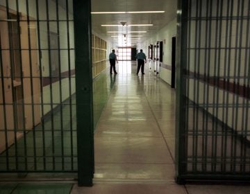 Officers at the Cumberland County Prison walk the halls in Carlisle, Pa. (AP Photo/Carolyn Kaster)