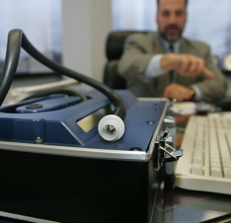 Cherry Hill, NJ lawyer Evan M. Levow is shown with an Alcotest 7110 MKIII-C machine at his office  in Cherry Hill, N.J., in a Tuesday, Nov. 22, 2005 file photo. The Alcotest, the successor to the Breathalyzer machine, is under scrutiny as the state Supreme Court considers an appeal challenging whether the machine provides reliable blood-alcohol level readings. (Jose F. Moreno/AP Photo, File)