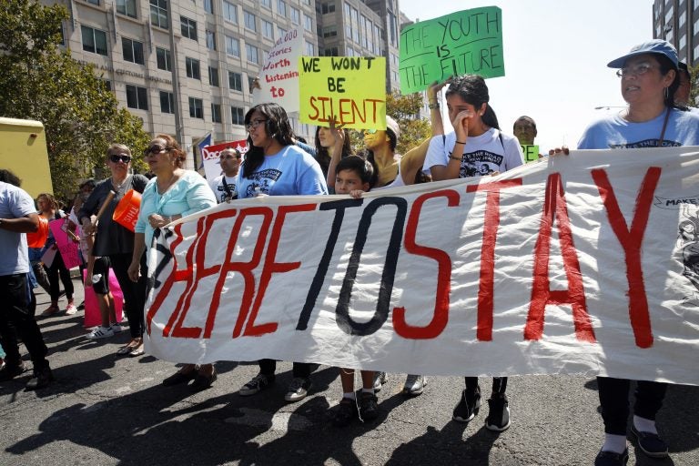 Cielo Mendez, 17, of Plainfield, N.J., who is a DACA recipient, (second from left with banner), marches next to Gabriel Henao, 7, and Kimberly Armas, 15, of Elizabeth, N.J., in support of the Deferred Action for Childhood Arrivals program, known as DACA, outside of Immigration and Customs Enforcement (ICE), in Washington, Tuesday, Sept. 5, 2017. (Jacquelyn Martin/AP Photo)