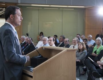In this June 22, 2016 photo made available by the U.S. Food and Drug Administration, Dr. Jeffrey Shuren, the FDA's Director of the Center for Devices and Radiological Health, speaks at FDA's Celebration of the 40th Anniversary of the Medical Device Amendments. Under Shuren, new device approvals have more than tripled, while warnings to device manufacturers about product safety and quality have fallen roughly 80 percent, an Associated Press investigation found. (Michael J. Ermarth/FDA via AP)
