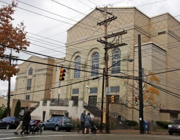 Families arrive for Shabbat morning services at Beth Shalom Synagogue in the Squirrel Hill neighborhood of Pittsburgh, on Saturday, Nov. 3, 2018. (AP Photo/Gene J. Puskar)