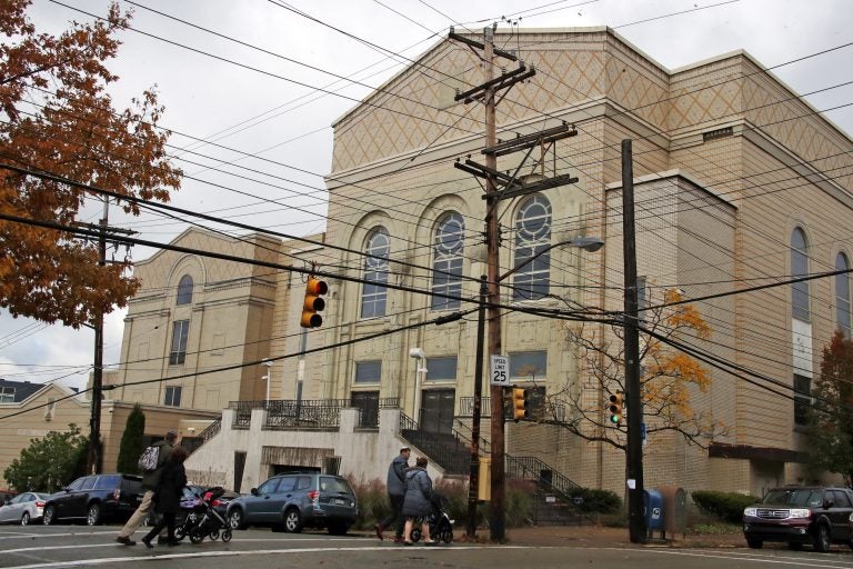 Families arrive for Shabbat morning services at Beth Shalom Synagogue in the Squirrel Hill neighborhood of Pittsburgh, on Saturday, Nov. 3, 2018. (AP Photo/Gene J. Puskar)