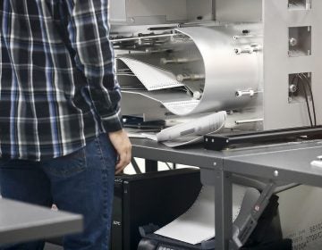 Elections staff prepare the machines for a recount at the Broward County Supervisor of Elections office on Sunday, Nov. 11, 2018, in Lauderhill, Fla. (AP Photo/Brynn Anderson)