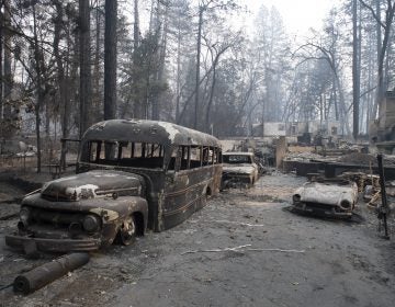 Burnt vehicles are seen in front of a destroyed house in Paradise, California, United States on November 16, 2018. Camp Fire has burnt so far 142,000 acres and is at 45% contained by Cal Fire. The death toll from the wild fire climbed to 63 with 631 on missing list. (Yichuan Cao/Sipa USA)(Sipa via AP Images)