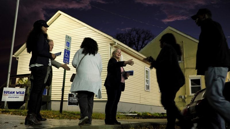 Democratic congressional candidate Susan Wild greets voters on election night. (Matt Smith for WHYY)