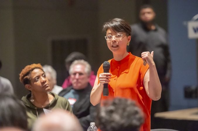 WHYY's Diana Lu recaps her table's discussion topic. (Jonathan Wilson for WHYY)