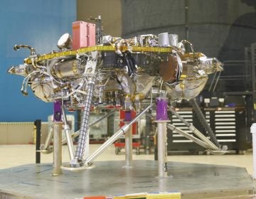 Once NASA's InSight Mars lander enters the Martian atmosphere and approaches the planet's surface, propulsive landing gear will slow the spacecraft down to about 5.5 mph (8.8 km/h) and safely set it down on the surface of the Red Planet. This image, taken at Lockheed Martin Space in Littleton, Colorado, shows several of the critical landing systems including the thrusters, lander legs and science deck. (NASA)