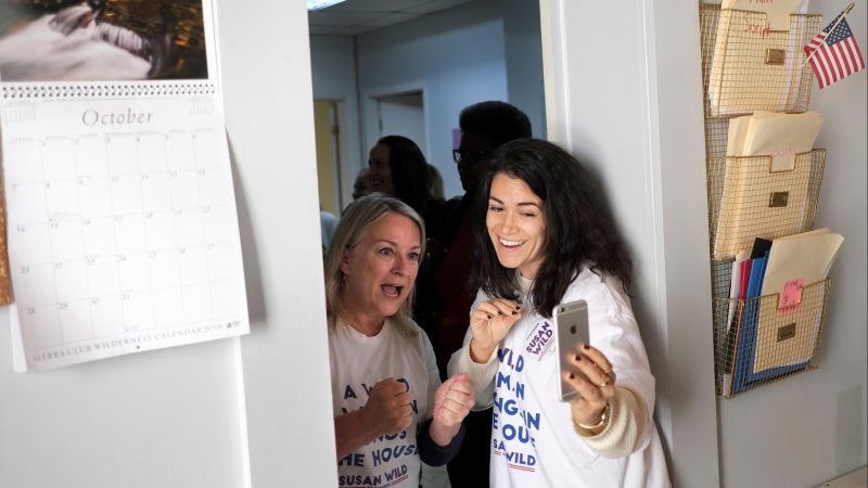 Broad City co-creator Abbi Jacobson films an Instagram story with Susan Wild, Democratic candidate for Pennsylvania's new 7th Congressional District, during a canvass launch event Oct. 13, 2018, at Wild's campaign office in Allentown, Pennsylvania. (Matt Smith for WHYY)