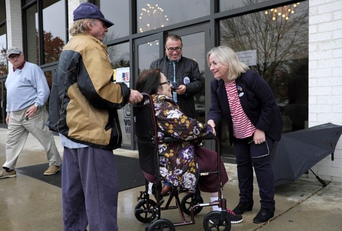 Susan Wild, Democratic candidate for Pennsylvania's new 7th Congressional District, greets voters on Election Day at Calvary Temple Church on Nov. 6, 2018, in Allentown, Pennsylvania. (Matt Smith for WHYY)