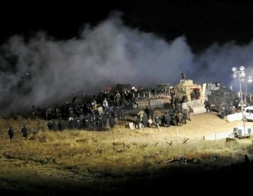 Law enforcement and protesters clash near the site of the Dakota Access pipeline in Cannon Ball, N.D., in November 2016.
(Morton County Sheriff's Department/AP)