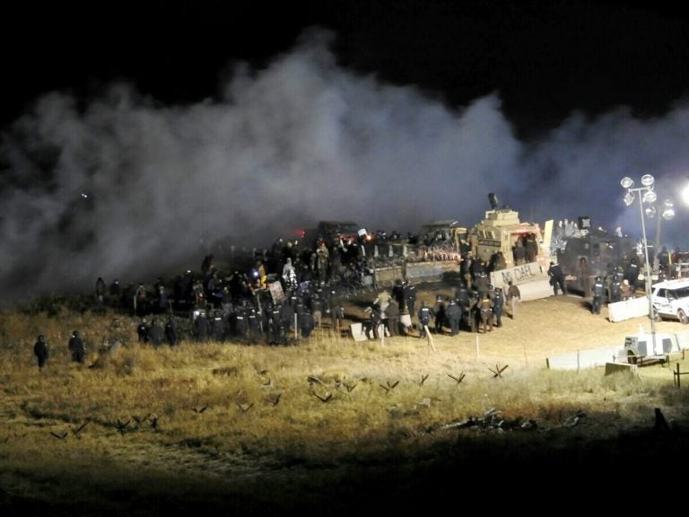 Law enforcement and protesters clash near the site of the Dakota Access pipeline in Cannon Ball, N.D., in November 2016.
(Morton County Sheriff's Department/AP)