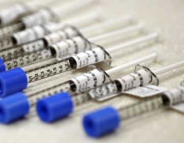 Syringes of fentanyl, an opioid painkiller, sit in an inpatient facility in Salt Lake City. According to the Centers for Disease Control and Prevention, opioid-related overdoses have contributed to the life expectancy drop in the U.S. (Rick Bowmer/AP)