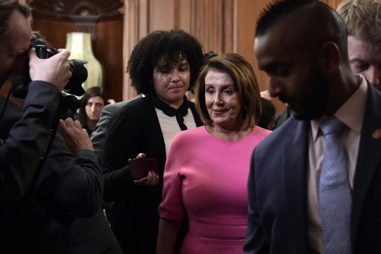 House Minority Leader Nancy Pelosi leaves a news conference on Capitol Hill on Wednesday. (Susan Walsh/AP)