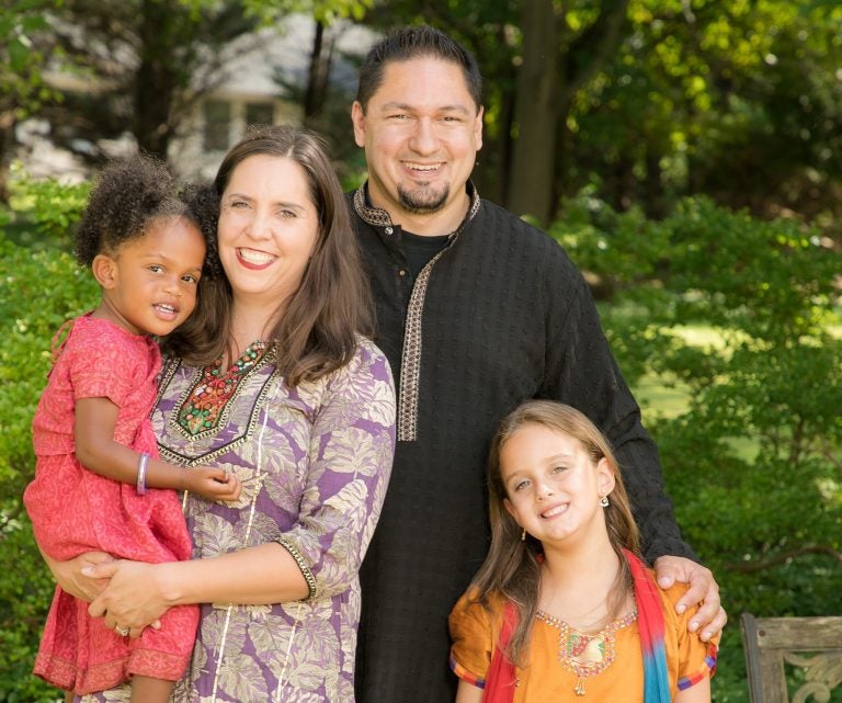 Tara and Alan Atchison with their two daughters.  (Image courtesy of the Atchison family)