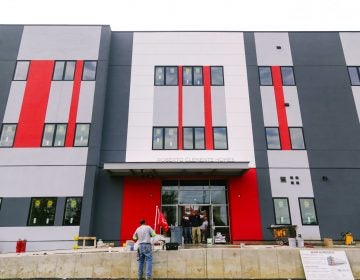 Construction workers put finishing touches on Roberto Clemente Homes. (Courtesy of Esperanza)