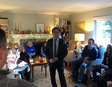 Democrat Andy Kim speaks to campaign volunteers at a home in Brick, New Jersey on Sunday, Nov. 4, 2018. (Joe Hernandez/WHYY)