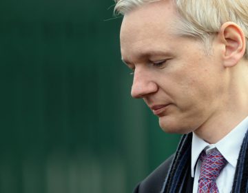 WikiLeaks founder Julian Assange could soon be facing criminal charges from the Department of Justice, according to language discovered in an unrelated court document by terrorism researcher Seamus Hughes. (Dan Kitwood/Getty Images)