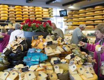 The European Union's highest court has ruled that a food's taste can't be copyrighted. Here, people shop for cheese in Gouda, Netherlands, in 2015. (Tim Graham/Getty Images)