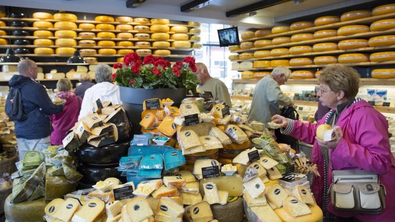 The European Union's highest court has ruled that a food's taste can't be copyrighted. Here, people shop for cheese in Gouda, Netherlands, in 2015. (Tim Graham/Getty Images)