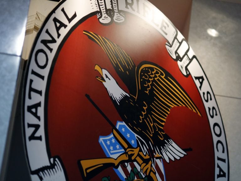 Doctors have been tweeting about their experiences treating victims of gun violence after the NRA mocked a position paper by the American College of Physicians. Above, the NRA logo in 2017 at an outdoor sports trade show in Harrisburg, Penn. (Dominick Reuter/AFP/Getty Images)