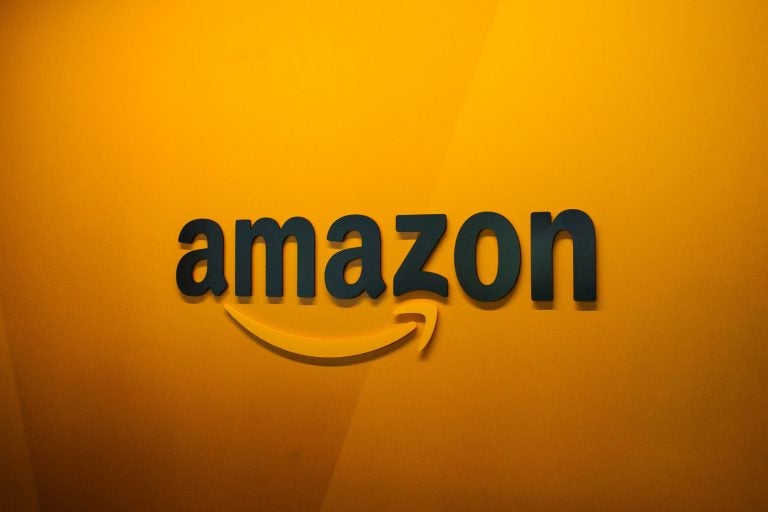 Splitting Amazon's second headquarters between two locations would dilute the company's original promise of a megadeal, but it could also relieve Amazon of being blamed for worsening traffic and increased housing prices. (David Ryder/Getty Images)