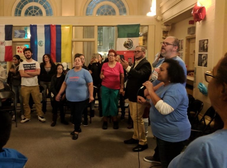 Volunteers with Make the Road Action in Pa. celebrate Democratic wins at the organization's office in Reading on November 6, 2018. (Rachel McDevitt/WITF)