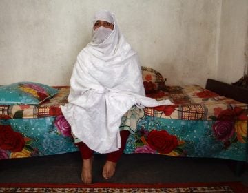 Mehnaz sits inside her home in Abbottabad, northern Pakistan. She has one son and six daughters. She has also had three abortions, fearing she would have more girls. (Diaa Hadid/NPR)