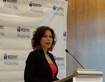 Women's Entrepreneurship Day conference organizer Elisa Bloom speaks to attendees in Philadelphia Monday. (Tom MacDonald/WHYY)