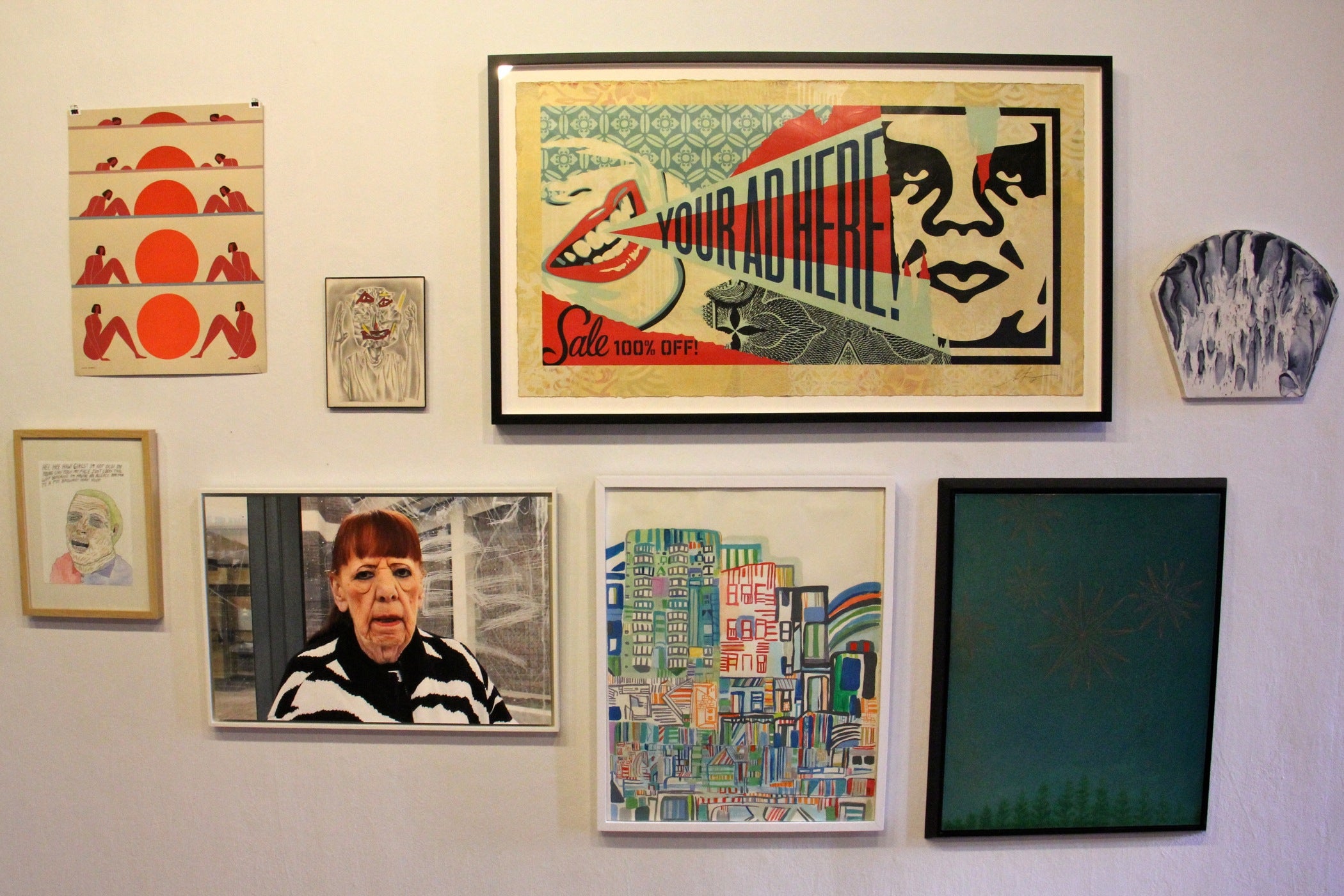 A photograph by Zoe Strauss (lower left) and a print by Shepard Fairey (upper right), which is expected to bring $11,000, are among the works to be auctioned for the benefit of Space 1026.