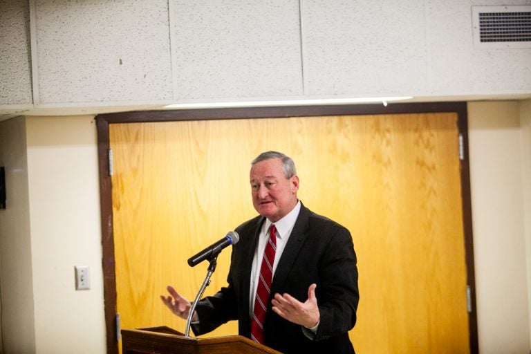 Philadelphia Mayor Jim Kenney speaks to Kensington residents about his opioid emergency response executive order at the McPherson Square Library Tuesday evening. (Brad Larrison for WHYY)