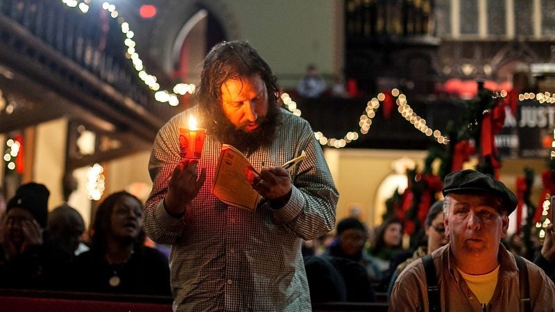 Neil Davis, who is currently homeless and has been since September, sings along to 