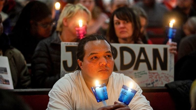 Candles are lit in memory of those who have died living on the streets of Philadelphia at a Homeless Memorial Day Service at Arch Street United Methodist Church Thursday evening. (Brad Larrison for WHYY)