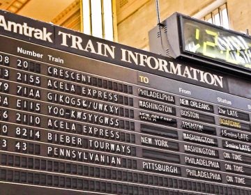 The flip-board sign at 30th Street is the last of its kind still in service at an Amtrak station (Kimberly Paynter/WHYY)
