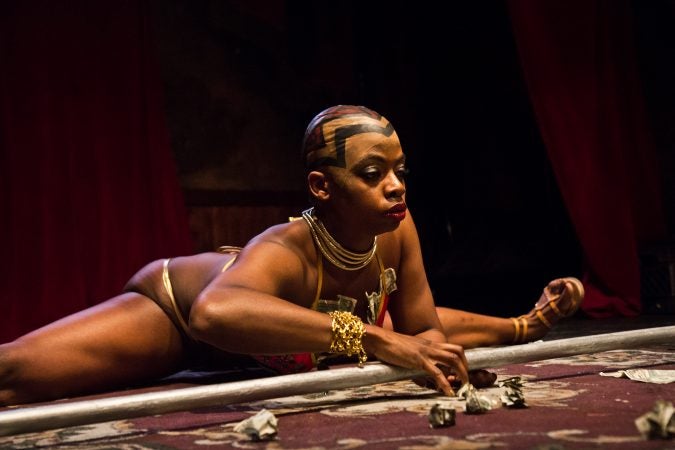 Renaissance Noir performs in the Black Panther Burlesque show at The Trocadero on Friday, May 11, 2018. Noier, who produced the show, was inspired by the general character, Okoye, who led the Wakandan armed forces in the movie. (Kimberly Paynter/WHYY)